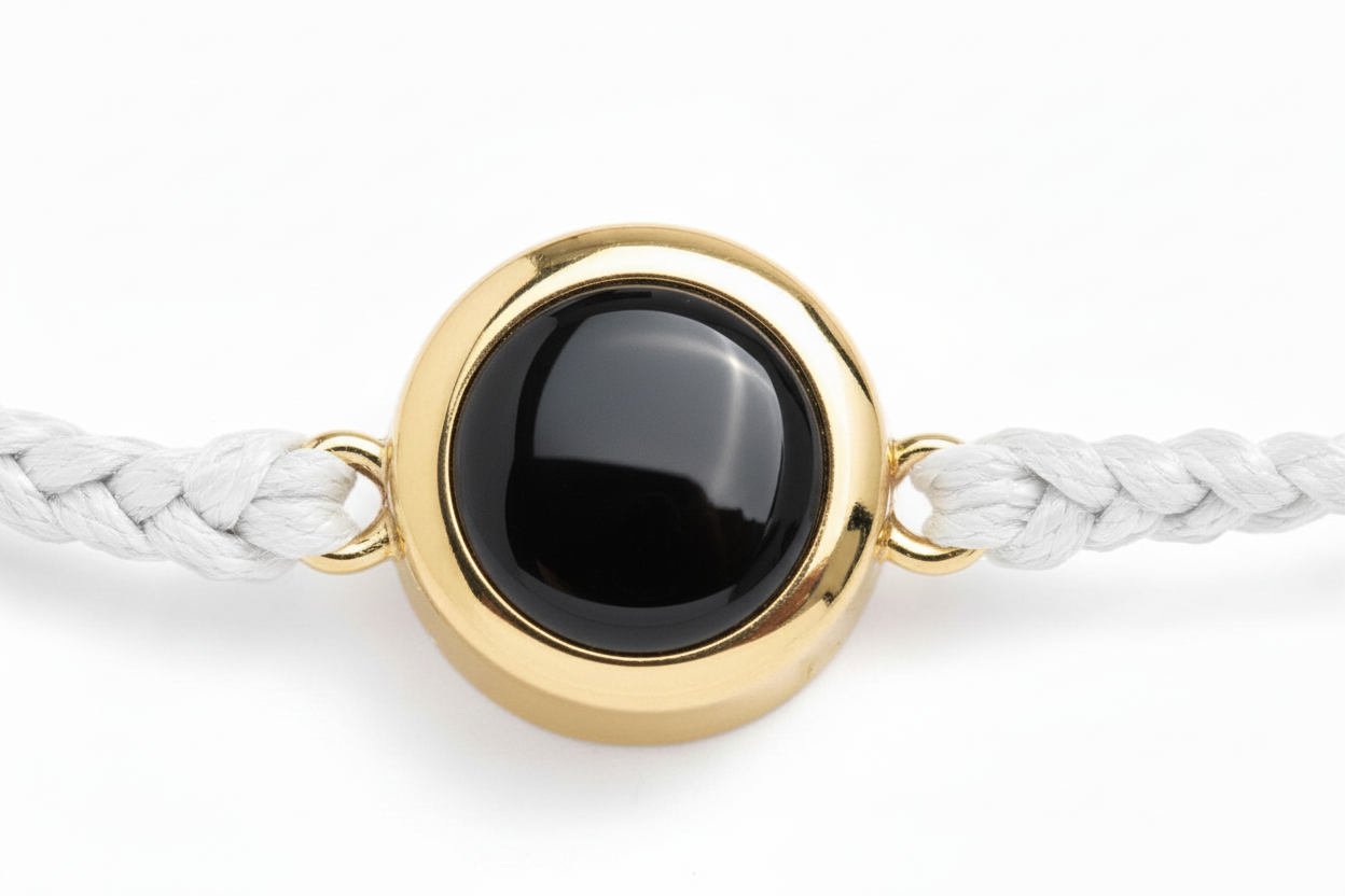 Bracelet with shiny black surface